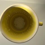 Vintage teapot with yellow filter