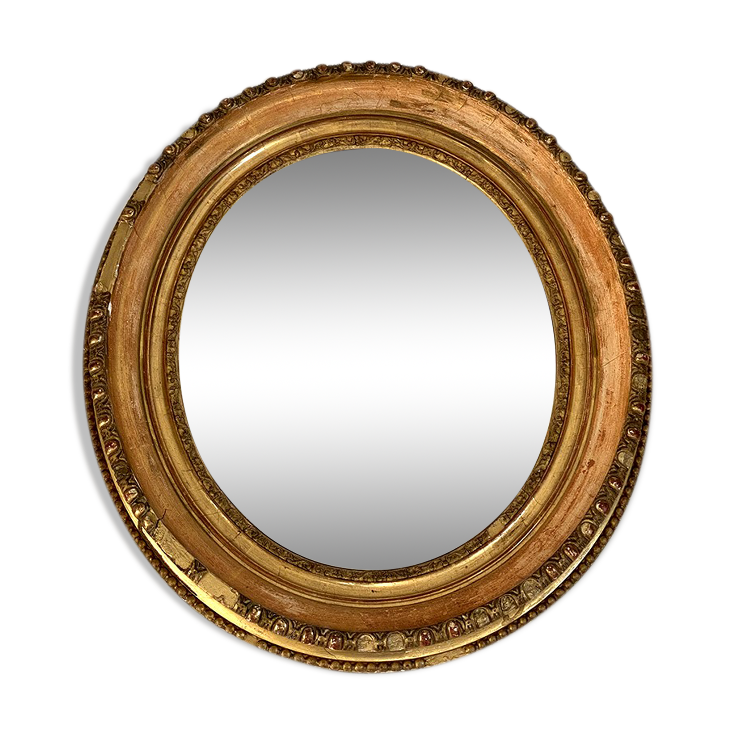 Miroir ovale en bois et stuc doré