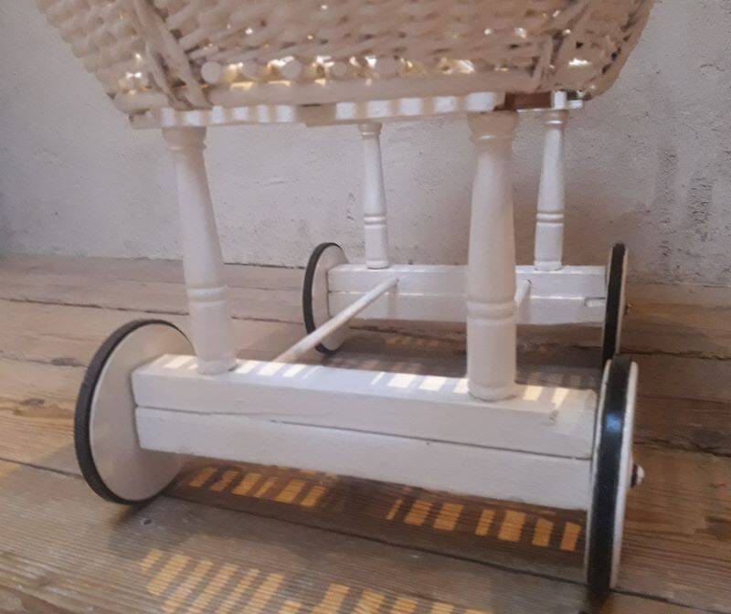 Wicker and painted wood baby cradle