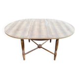 19th-century round extendable dining table with crossed legs, 115cm.