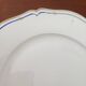 Dish on porcelain pedestal E. BOURGEOIS