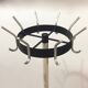 Coat rack on turnstile stand