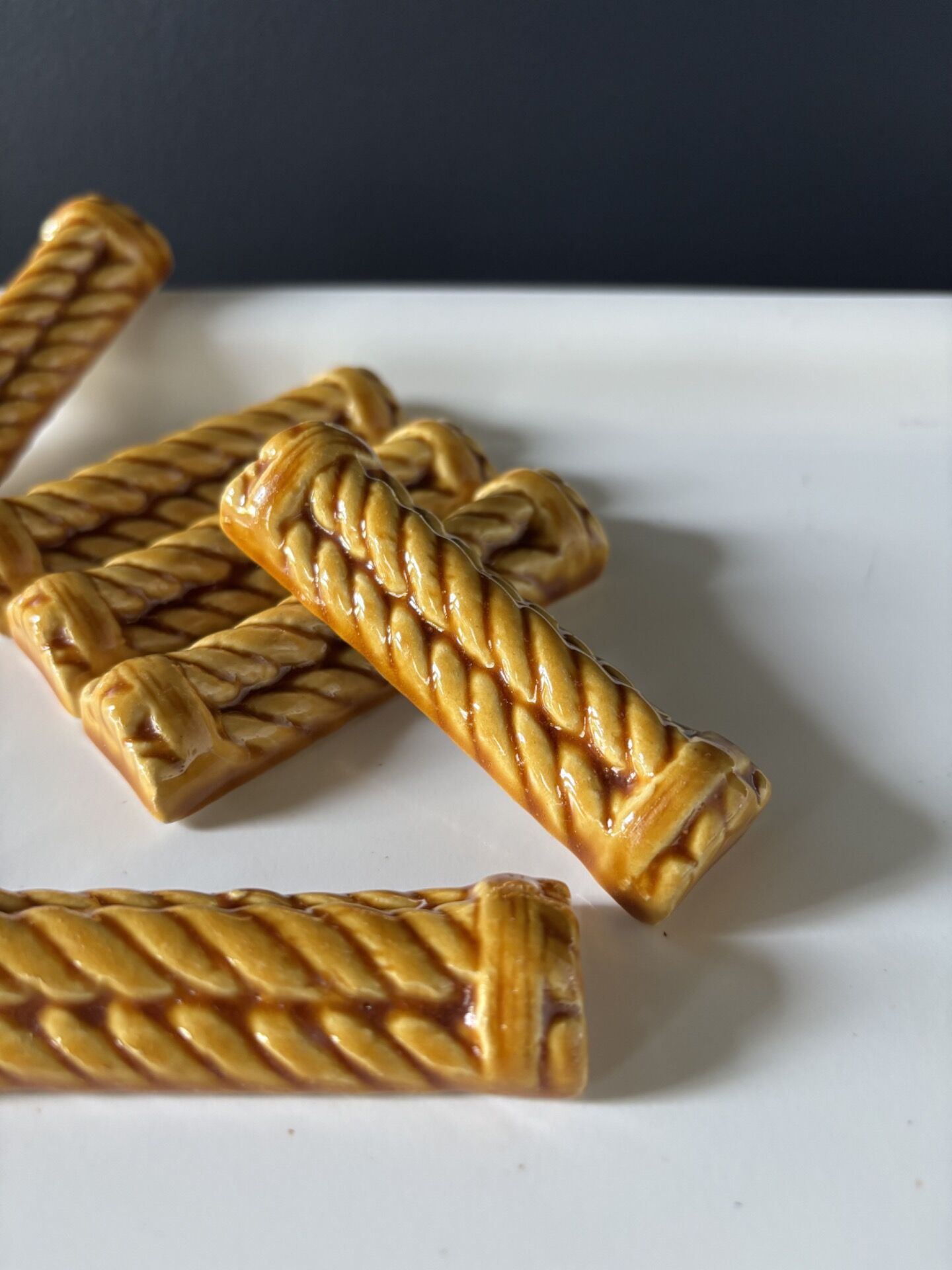 Woven ceramic knife holder