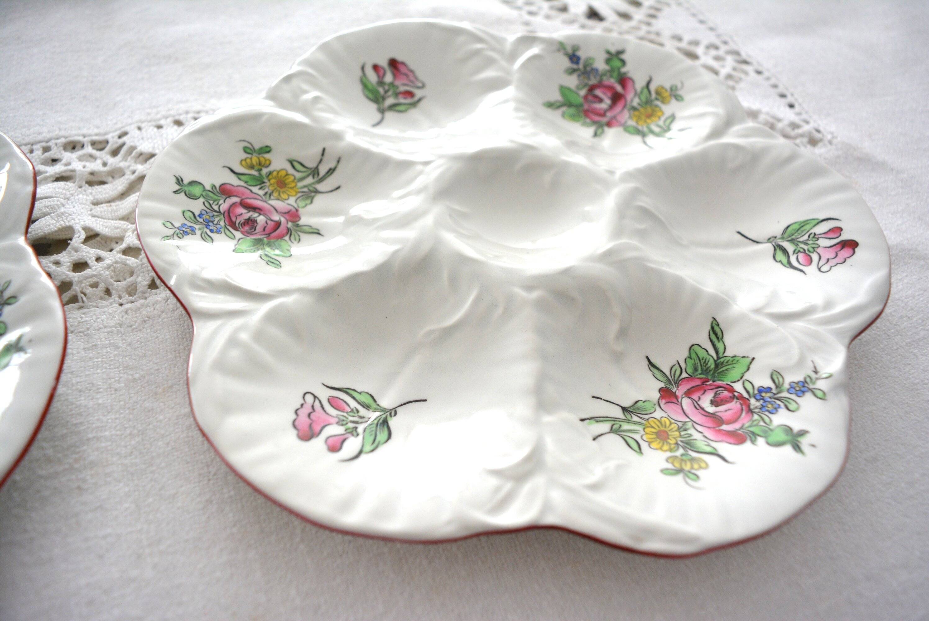 Pair of oyster plates, ceramic, flowers