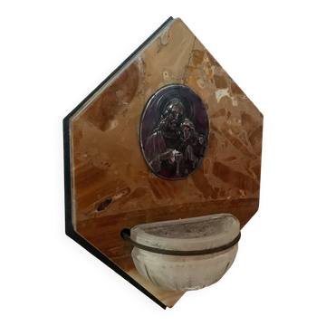 Ancient marble holy water font