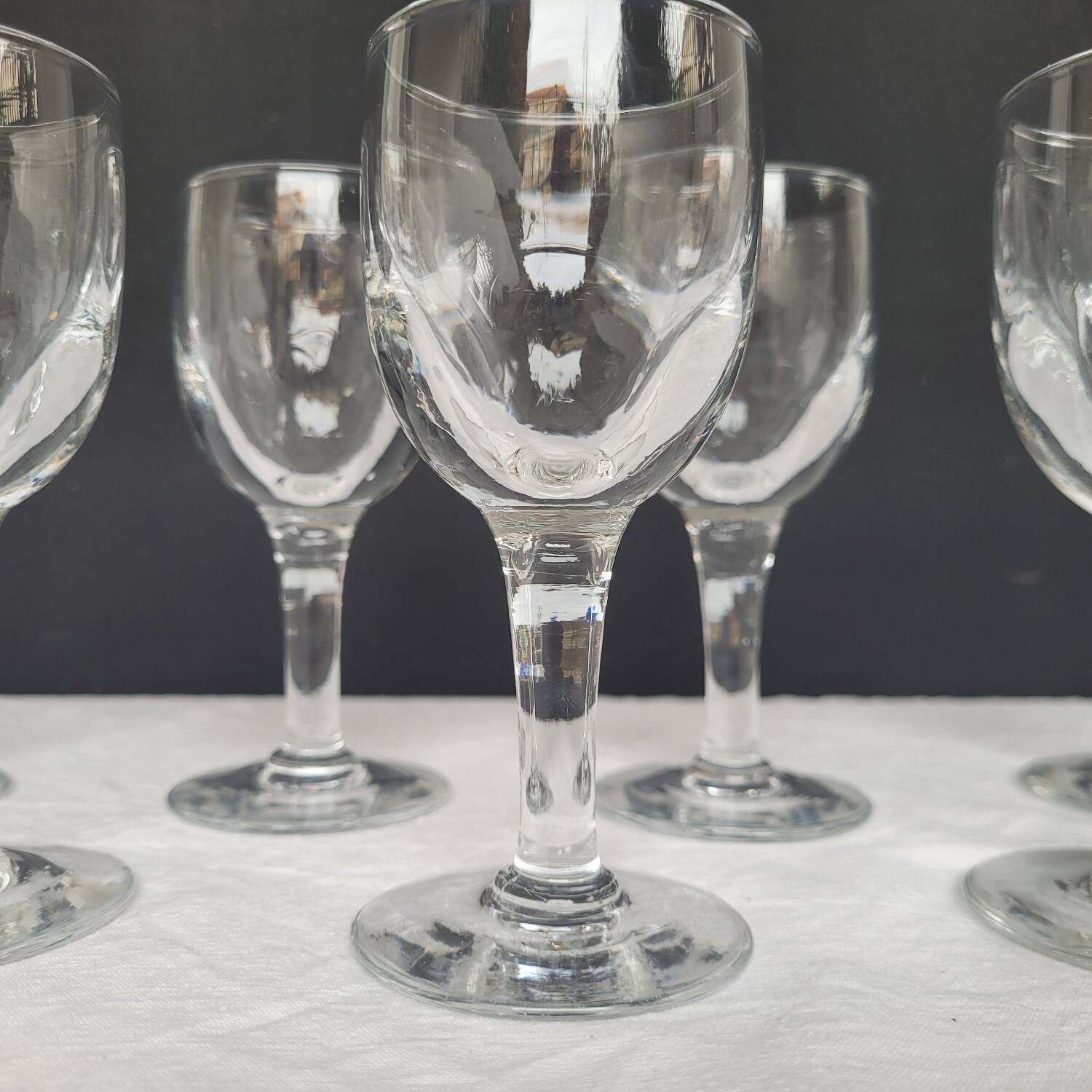 7 antique stemmed glasses made of blown glass – 1930s–1950s