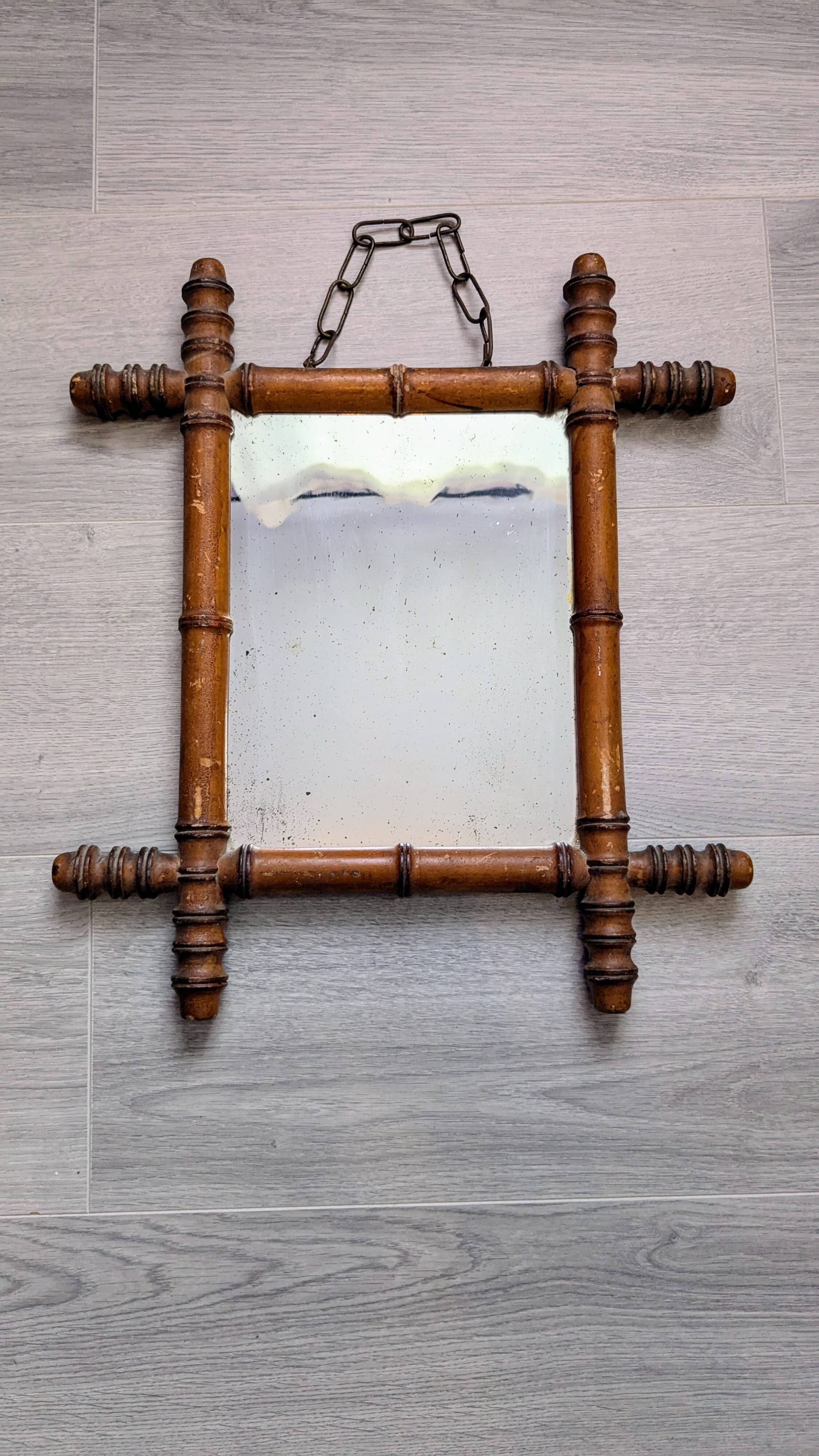 Antique turned bamboo mirror with pitted glass 45x39 cm