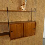 Wall rack with hanging cupboard, shelves and steel holders vintage