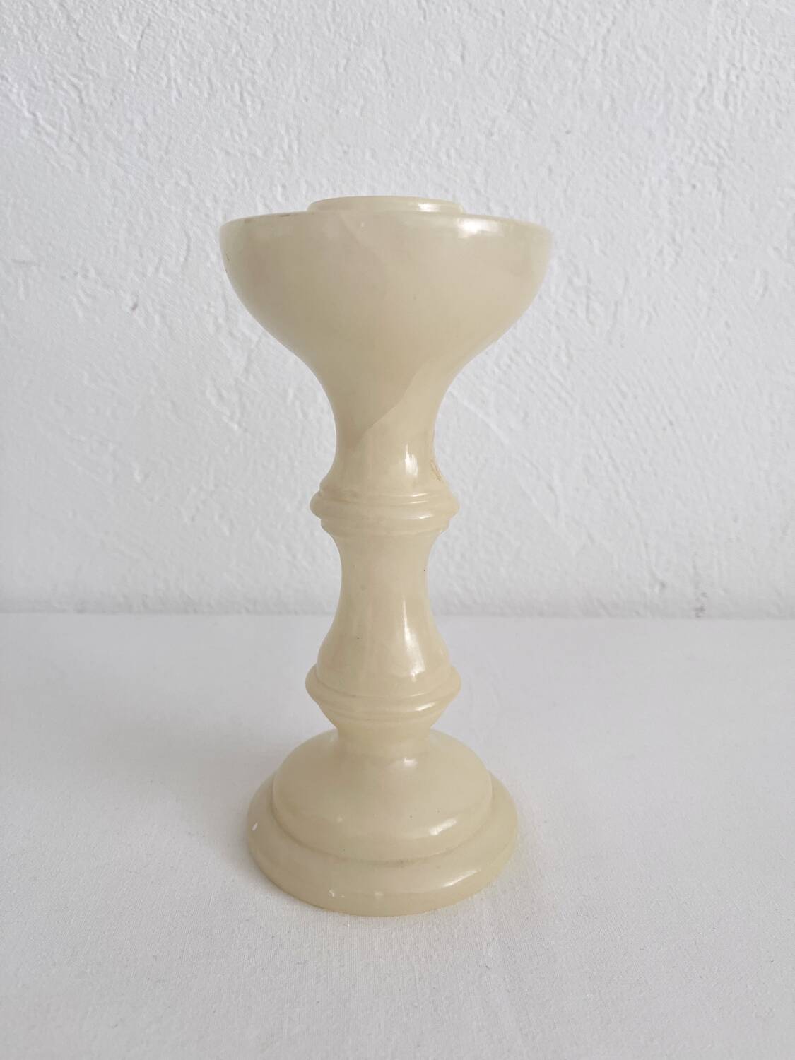 Vintage alabaster-style resin candlestick holder