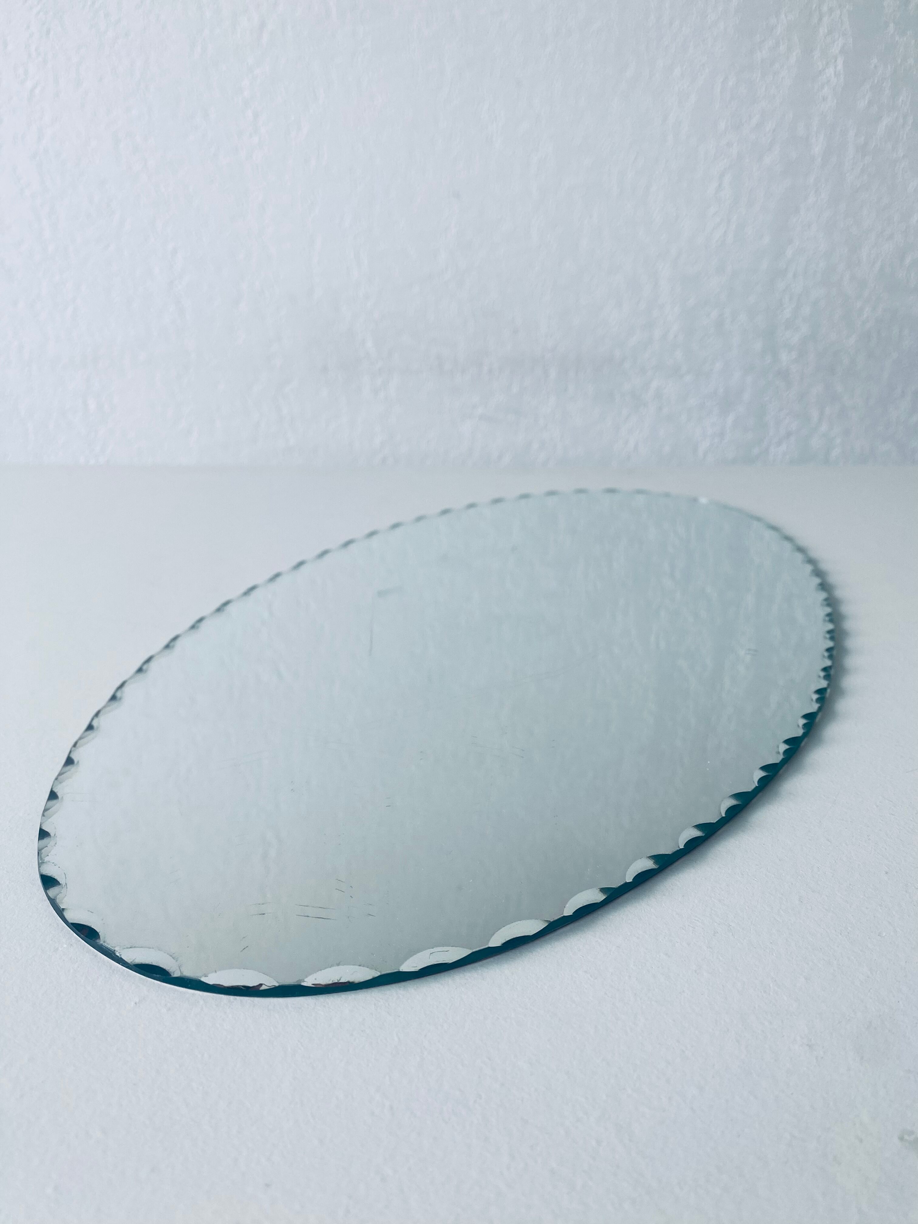 Oval beveled mirror 50x25cm