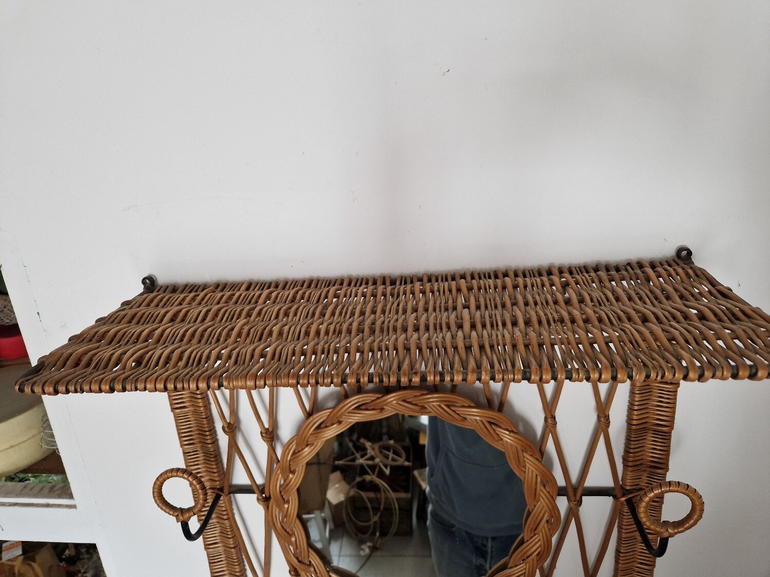 Woven wicker coat rack