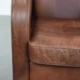 Beautiful art deco design armchair made of cowhide leather in English style