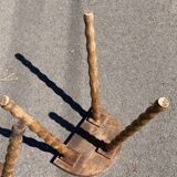 Pair of tripod farm stools in turned wood