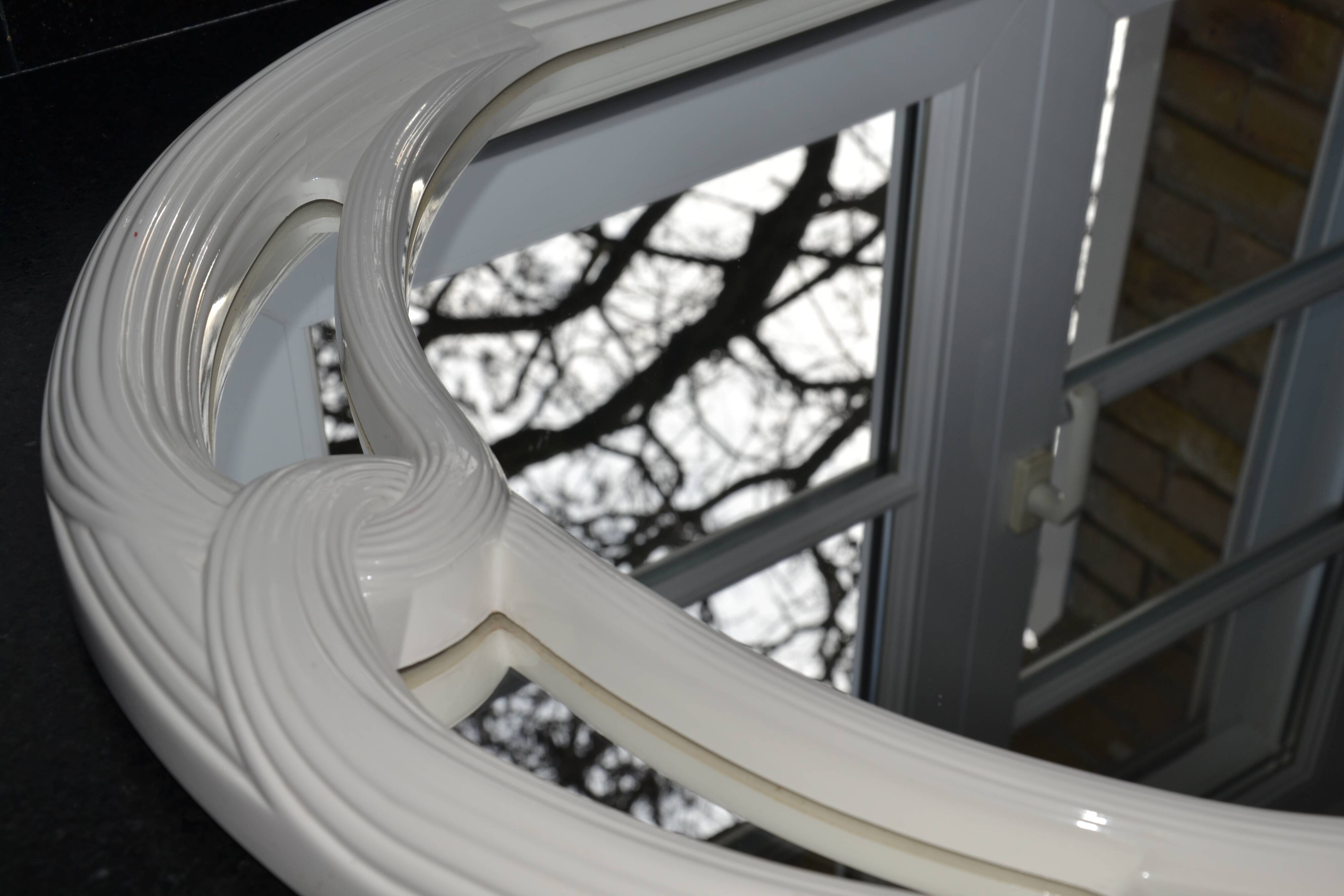 White mirror in 90s Art Deco style