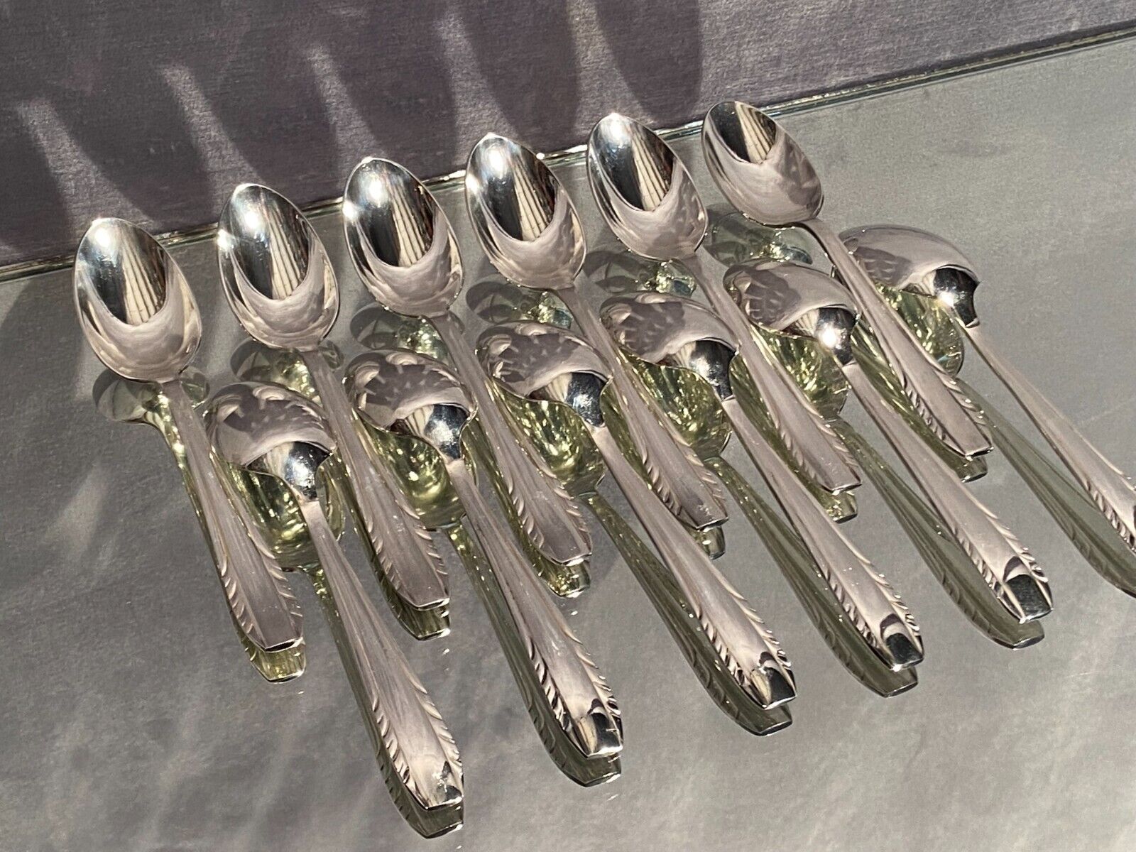Suite of 12 small silver metal spoons design Vintage mid-twentieth