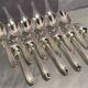 Suite of 12 small silver metal spoons design Vintage mid-twentieth