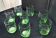 8 Verres à eau forme gobelet en verre vert  Décor gravé