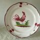 Assiette en faience st clement coq aux cerises 20 eme