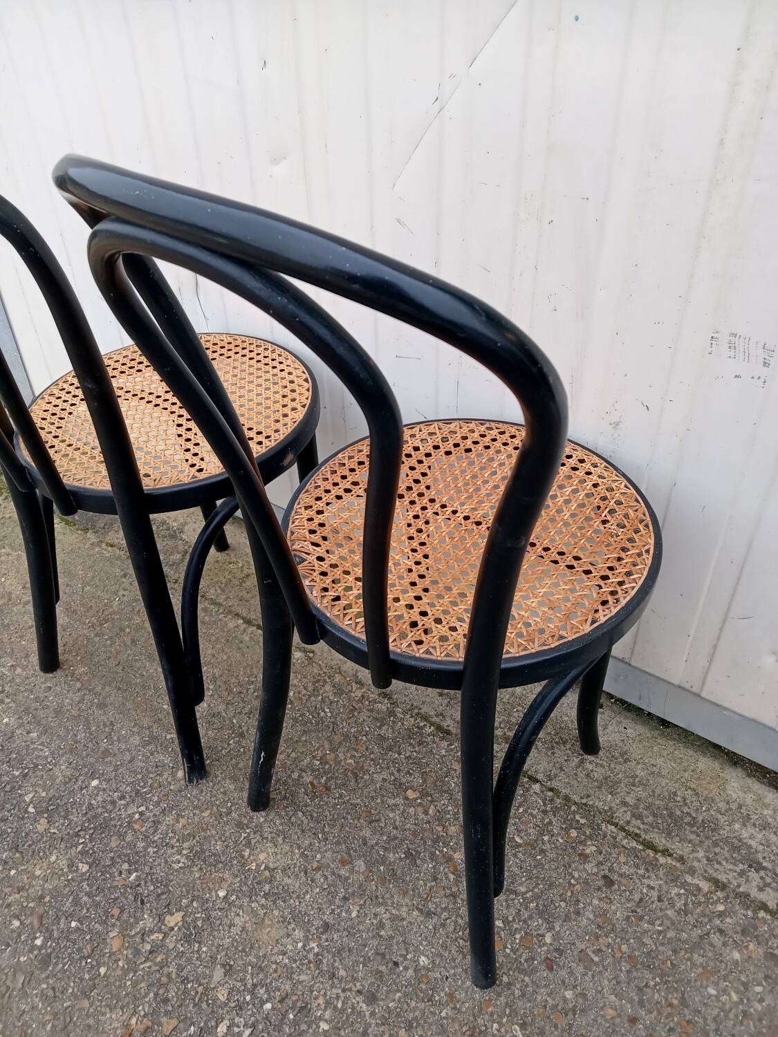 Pair of fmg bentwood and cane bistro chairs
