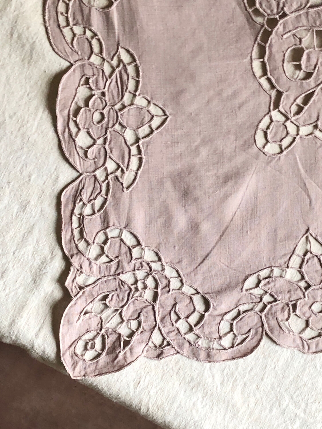 Old embroidered towel tinted purple aurora