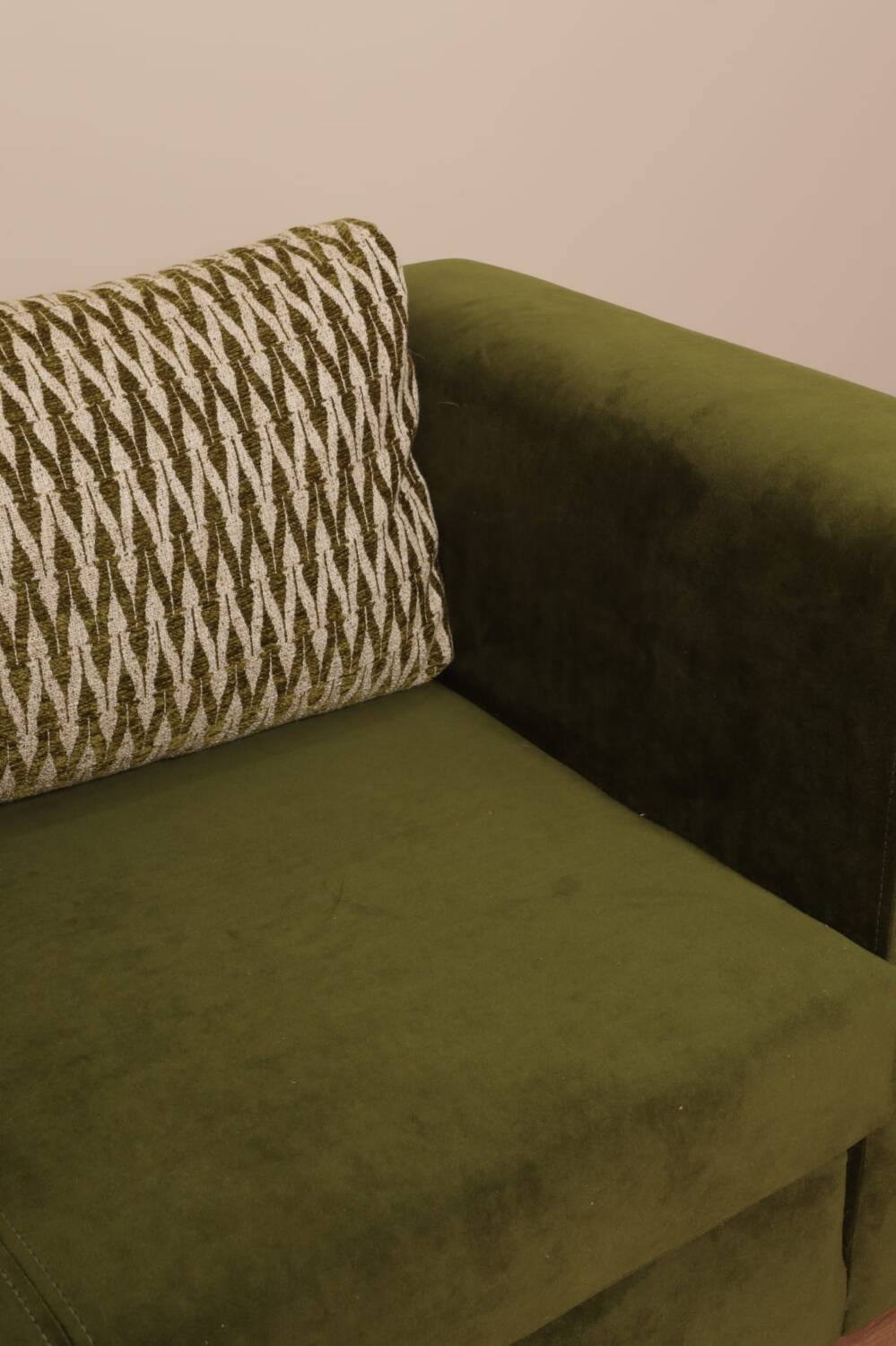 Olive velvet two-seater sofa