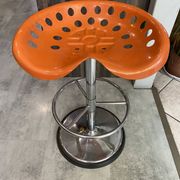 Orange tractor stool, pivoting adjustable mower, Fermigier Mirima 70.