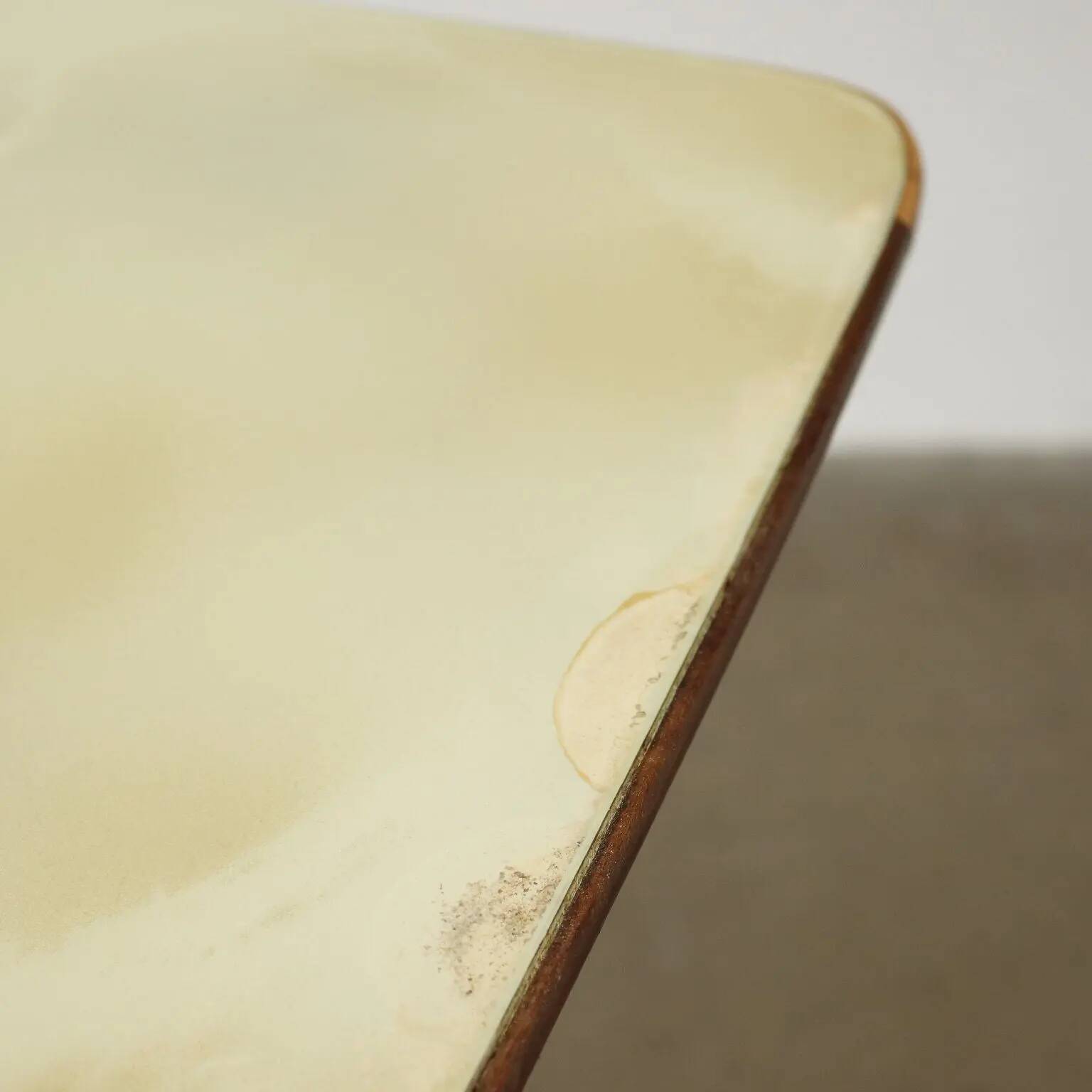 1960s vintage table made of wood and metal with a glass top, Italy.