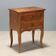 Antique baroque bedside table in walnut and rosewood, Italy, 18th century.