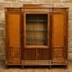 Important showcase library in fine wood and marquetry, stamped.