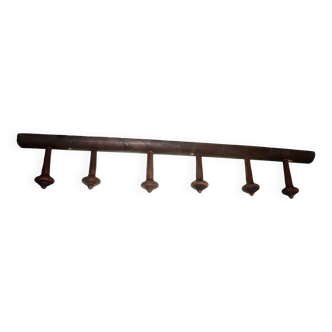 Wooden wall-mounted coat rack