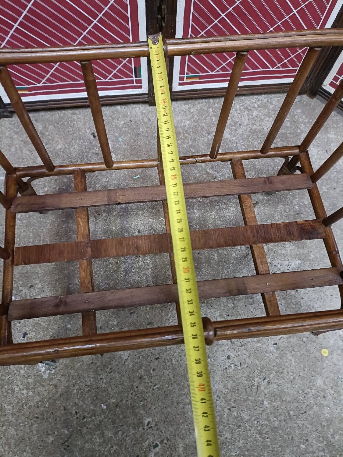 Old small bed or cradle for baby in vintage rattan