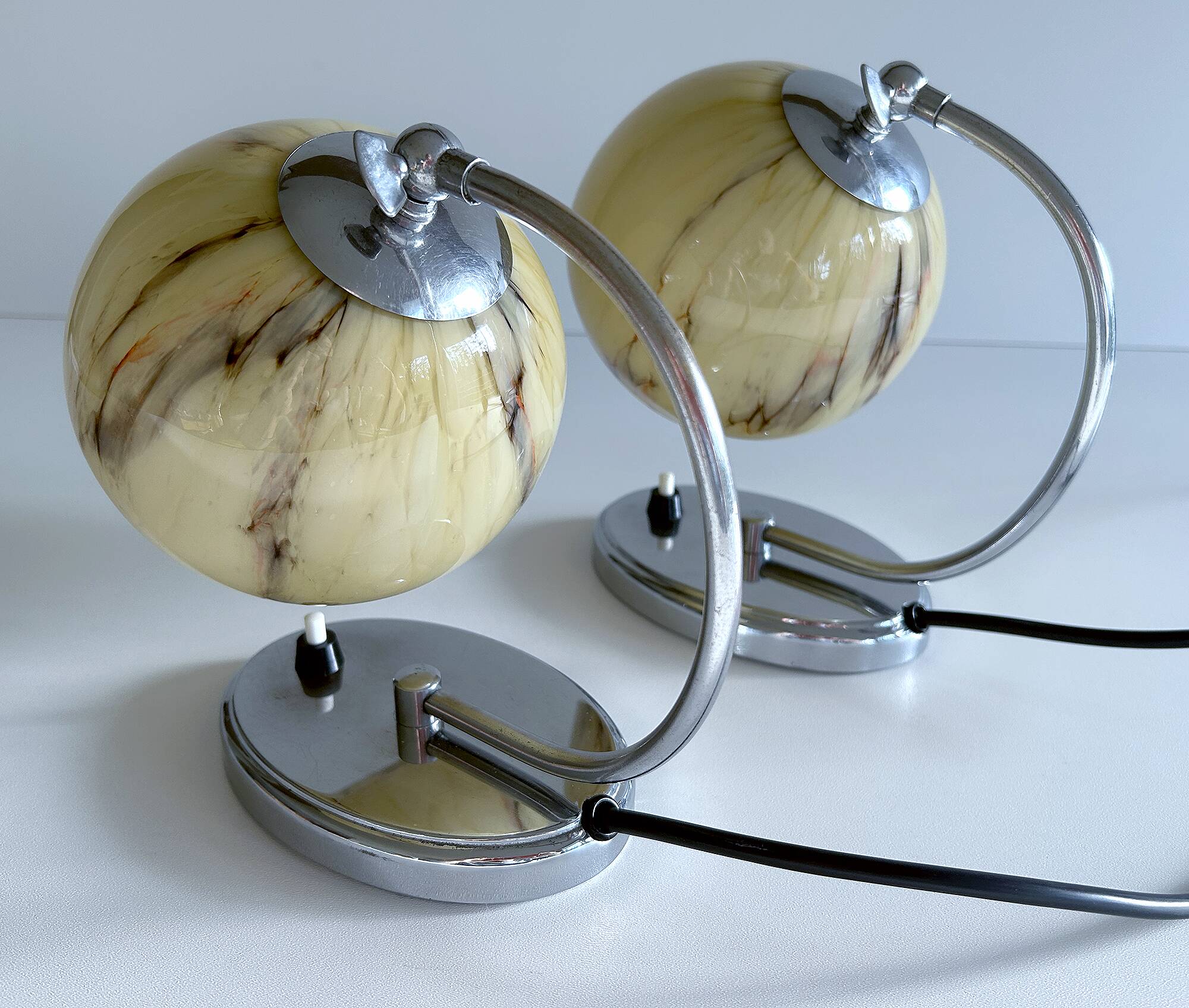 Pair of art deco lamps, chrome glass
