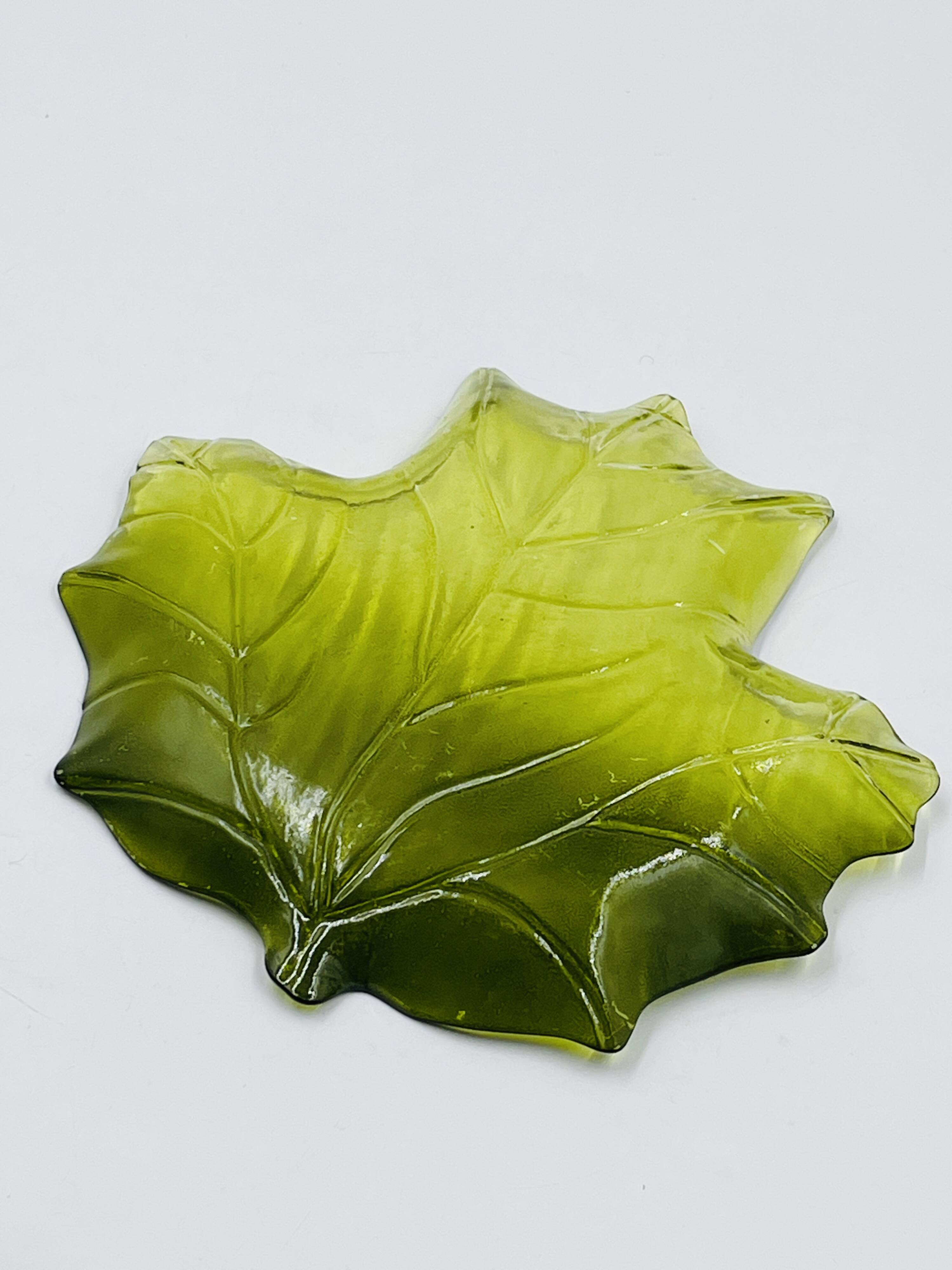 Vintage green glass leaf catchall from the 1970s.