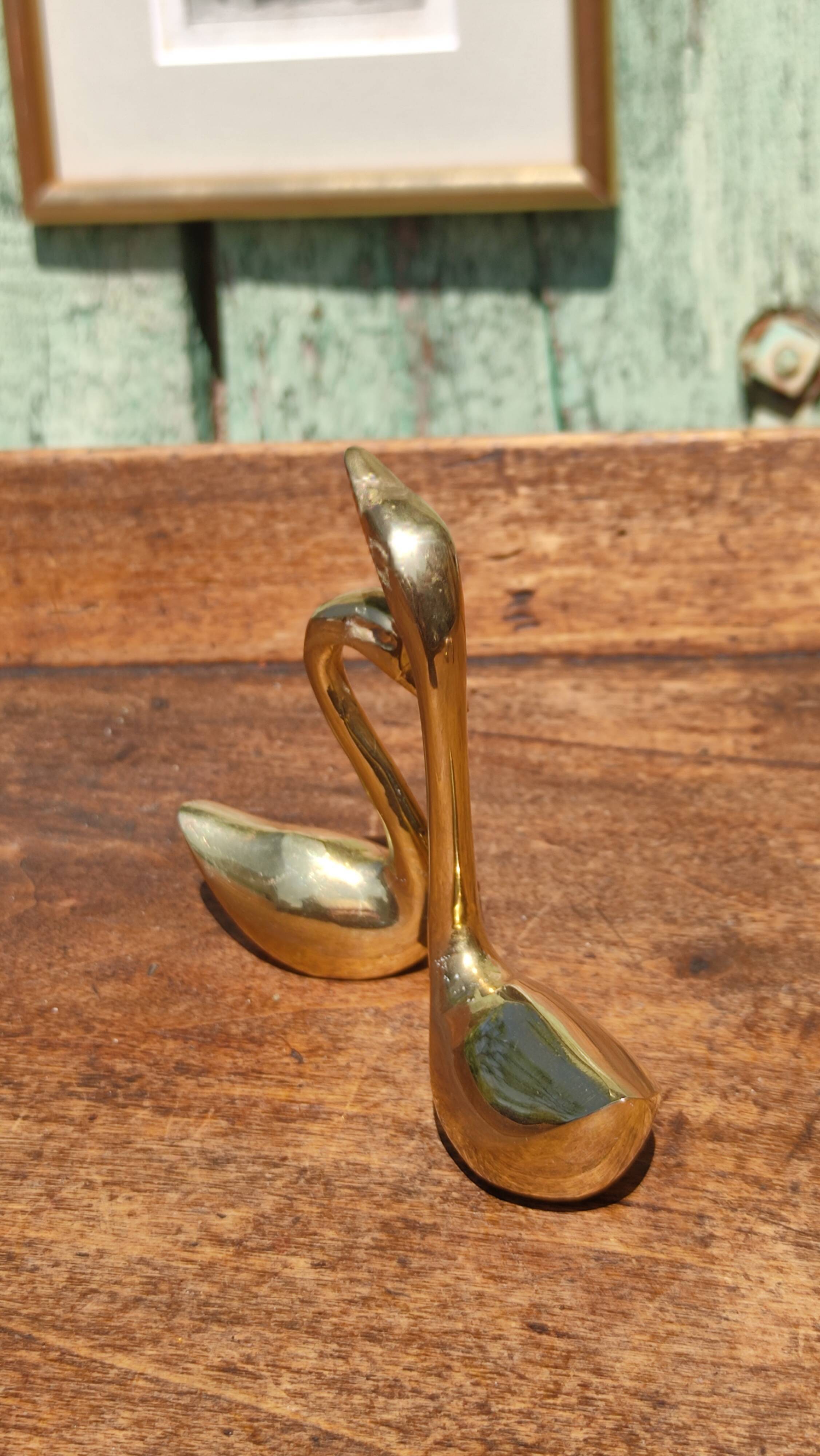 Pair of golden brass swans