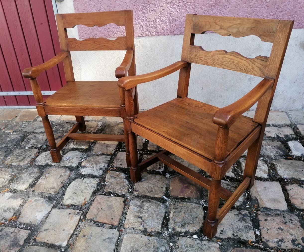 Pair of vintage oak armchairs with geometric design.
