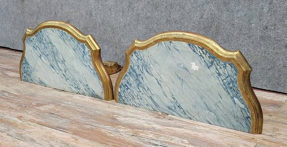 Pair of Louis XV style wall consoles in gilded wood
