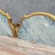Pair of Louis XV style wall consoles in gilded wood