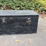 Old wooden trunk with interior compartments