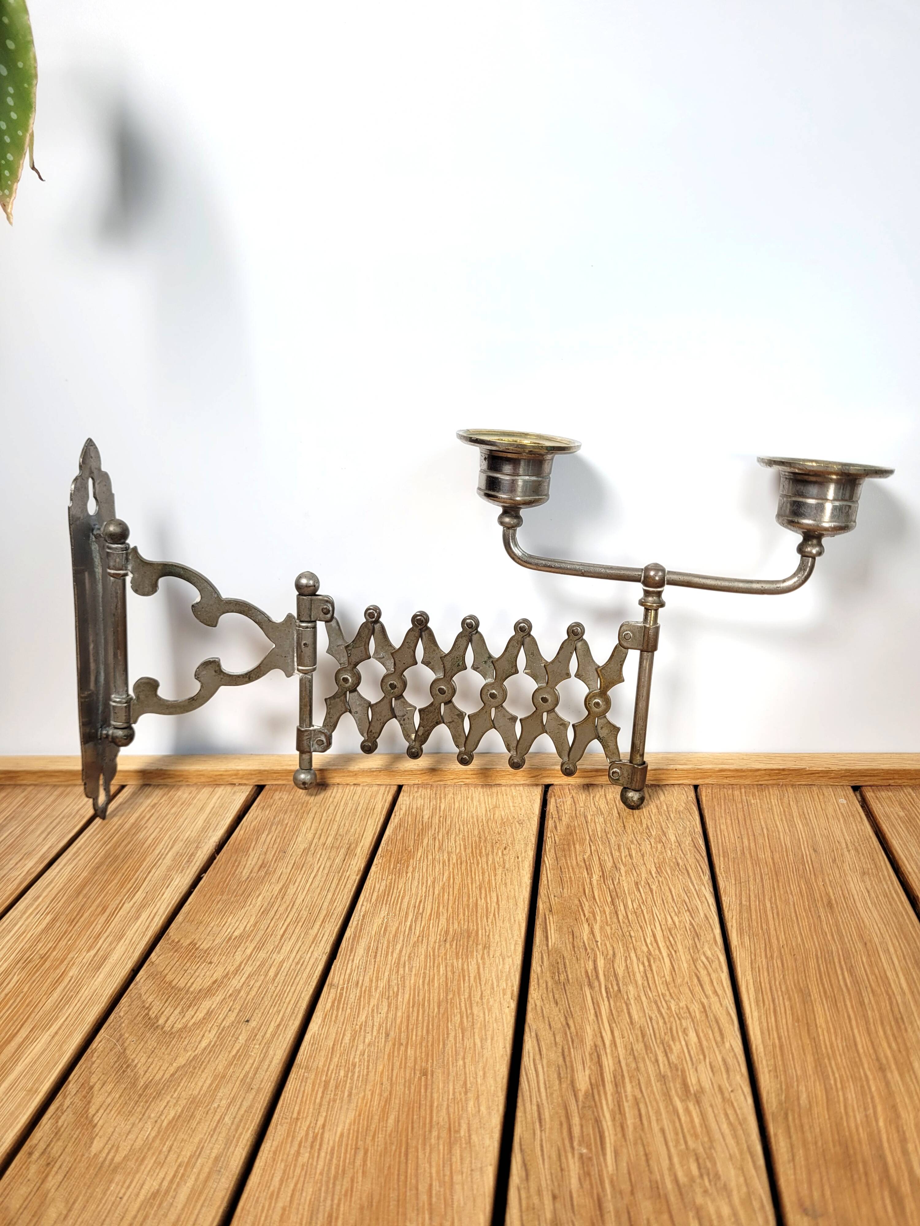 Extendable wall candle holder