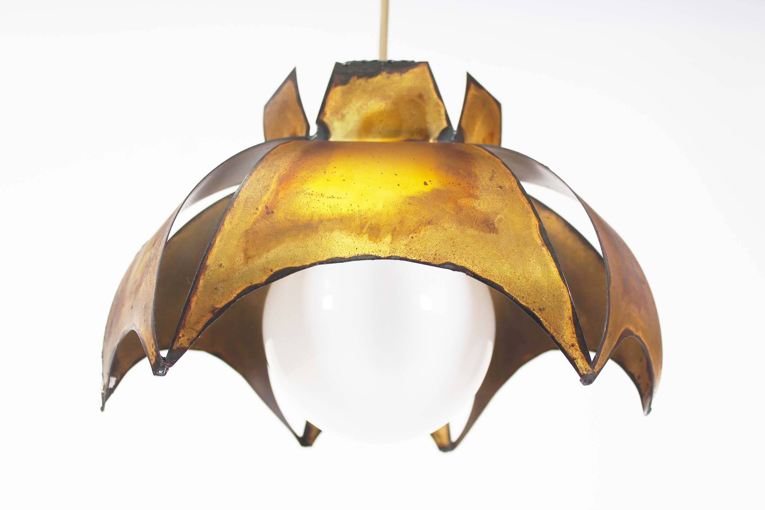 Original Italian torch cut brutalist brass chandelier