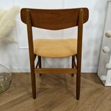 Scandinavian chair with mustard yellow fabric