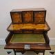 Marquetry stepped desk with La Fontaine's fables, 19th century.