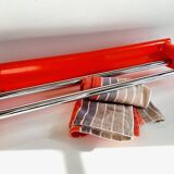 Orange towel rack by Syla from the 70s
