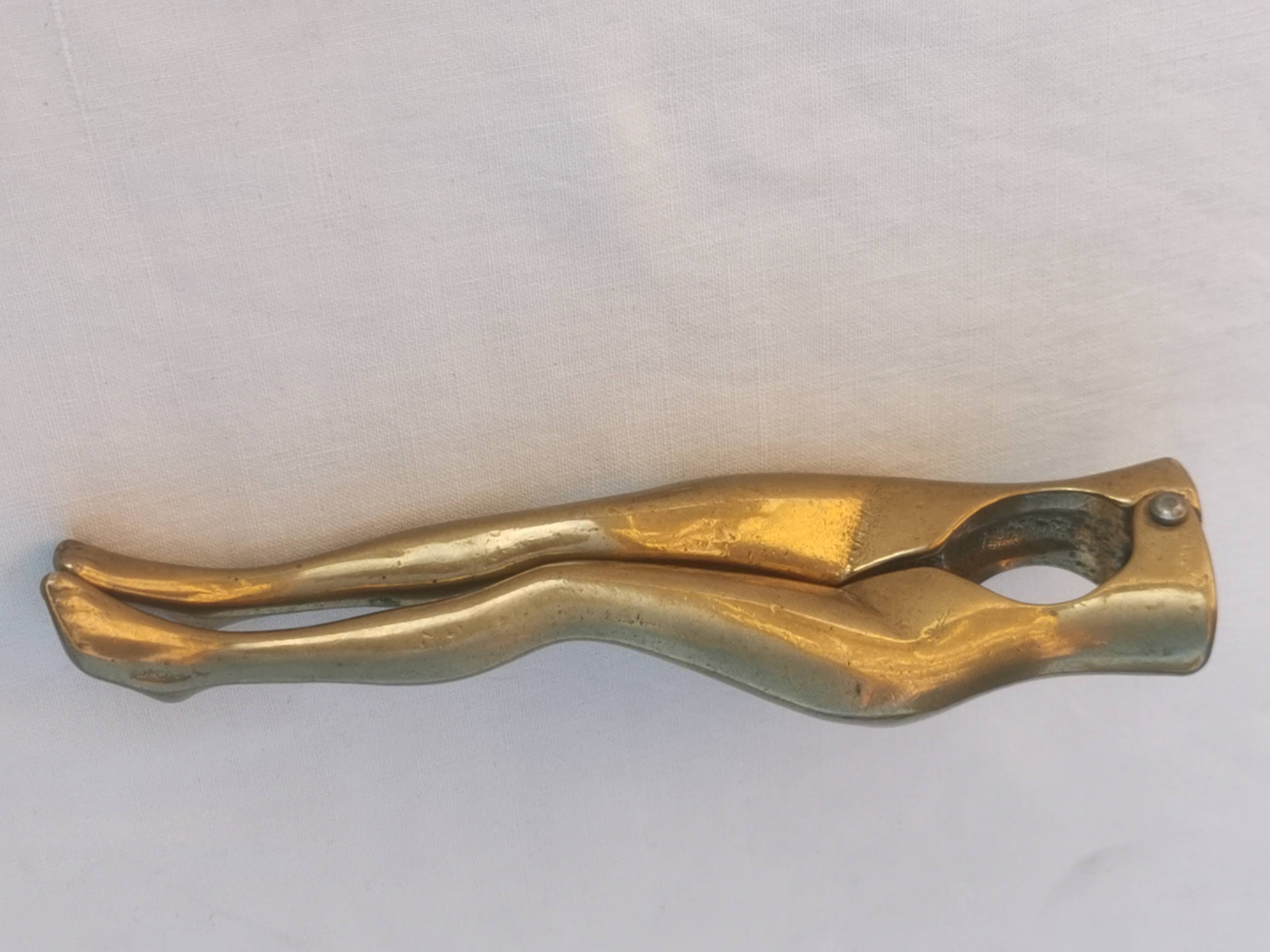 “woman’s legs” nut cracker in bronze