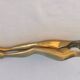 “woman’s legs” nut cracker in bronze