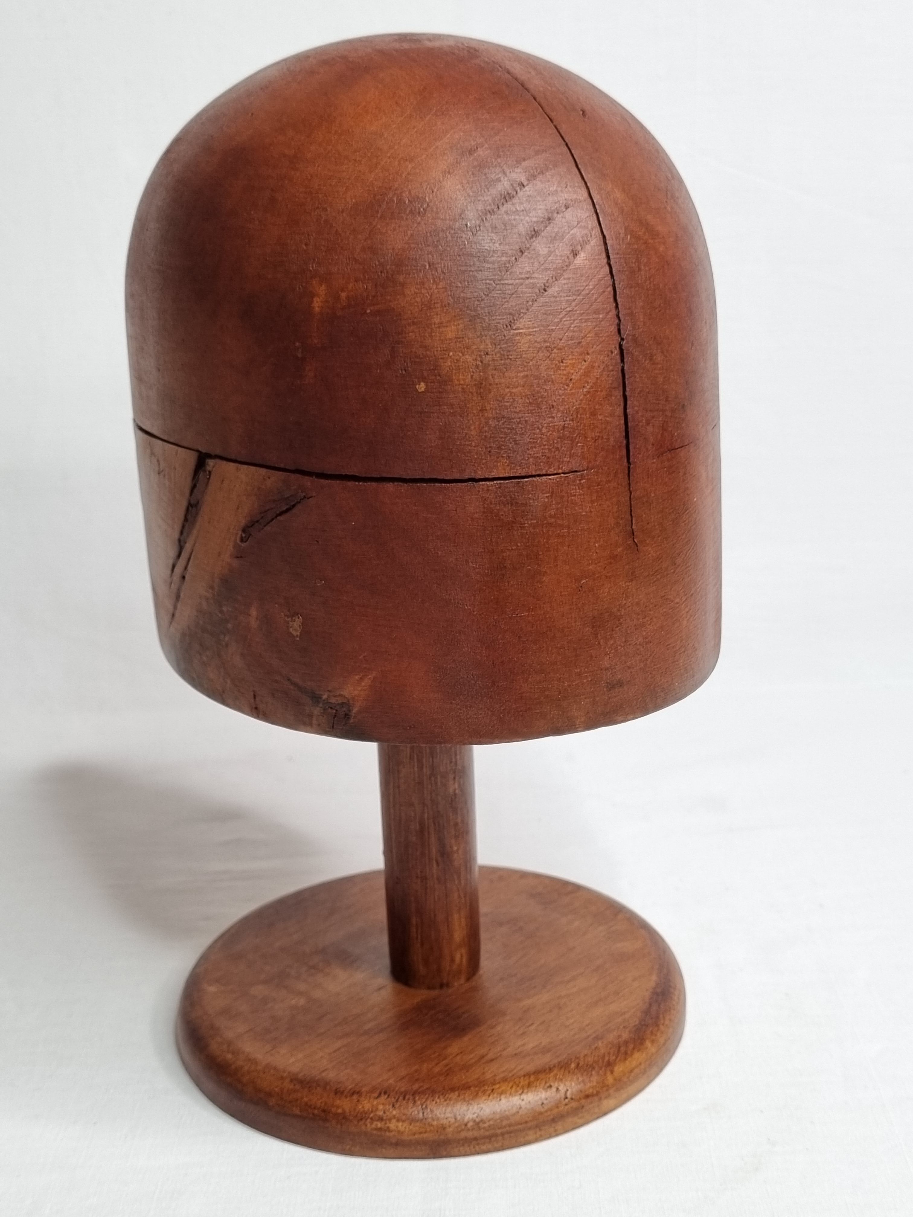 Old wooden hat shape on foot, 1900