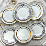12 Mismatched porcelain plates
