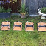 4 Chairs with chrome tubular metal base and black Skaï