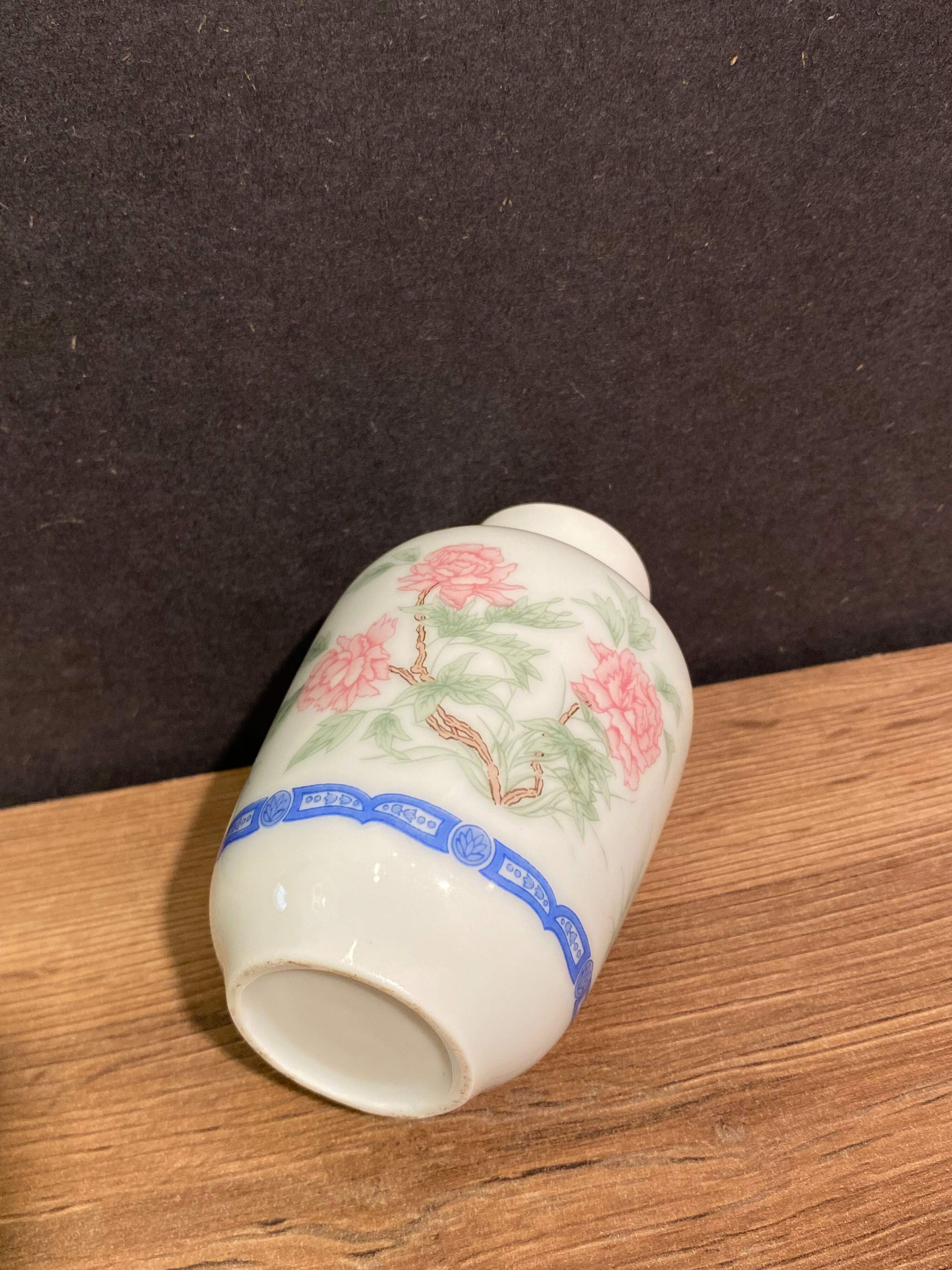 Miniature porcelain vase with floral decoration, Rose family