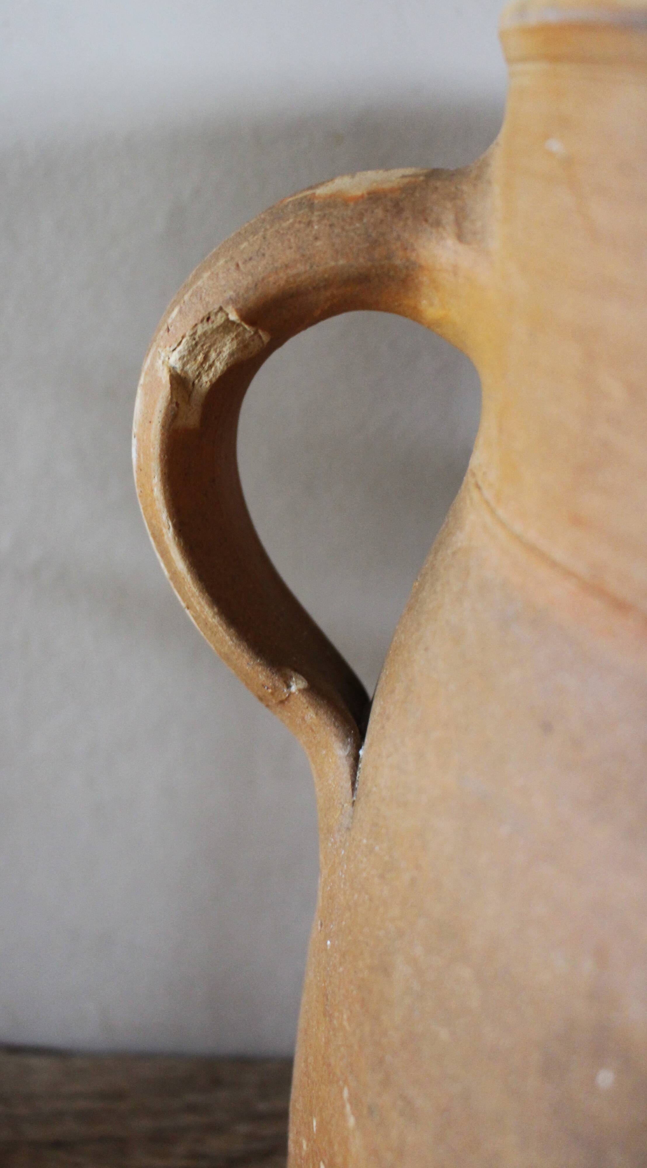 Vintage artisanal terracotta jug